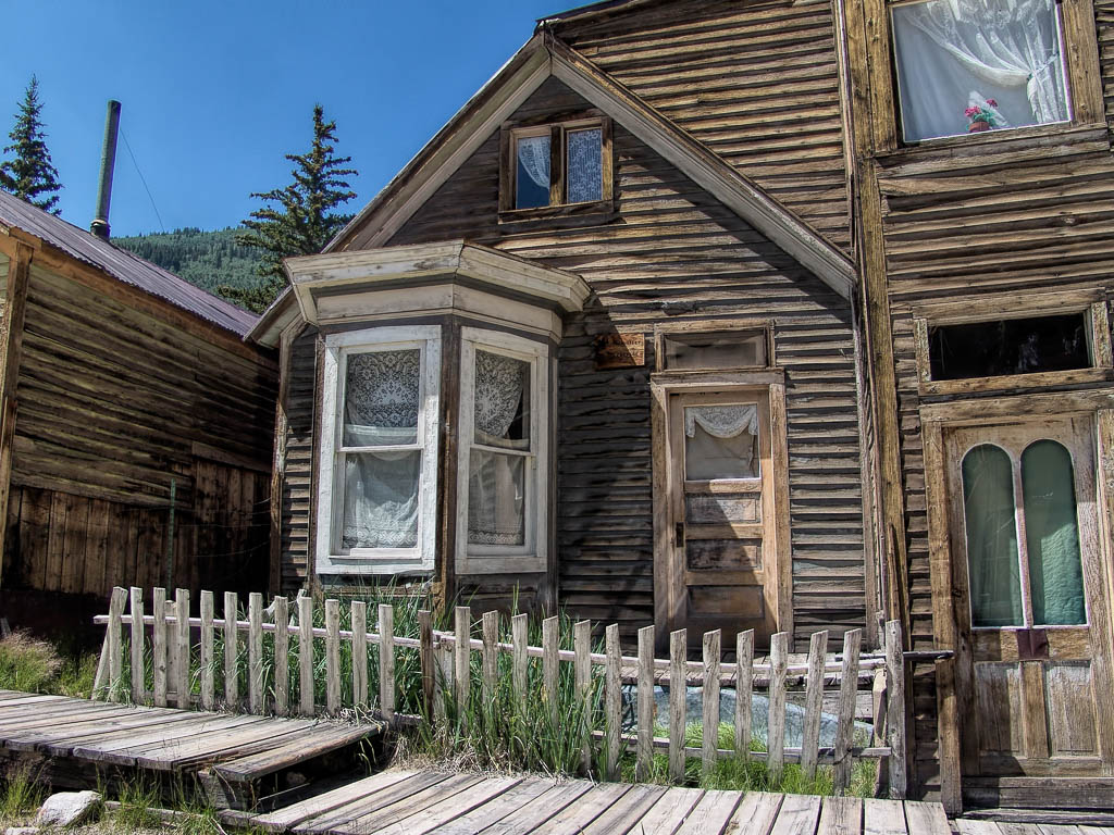 House with bay window on Main Street St. Elmo Colorado — original 1880s residential architecture