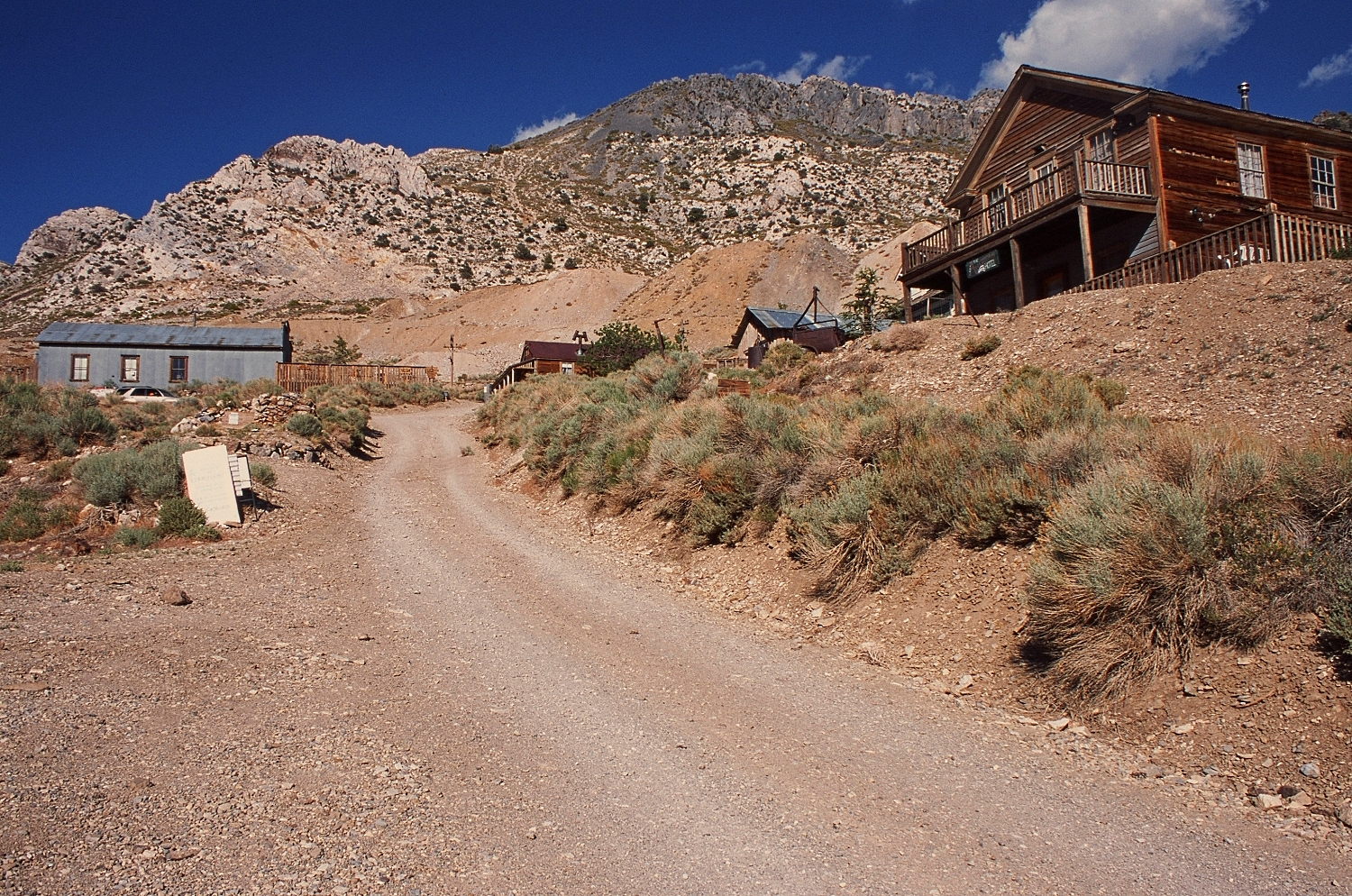 Main street of Cerro Gordo ghost town looking east toward mine dumps and Cerro Gordo Peak, Inyo County California