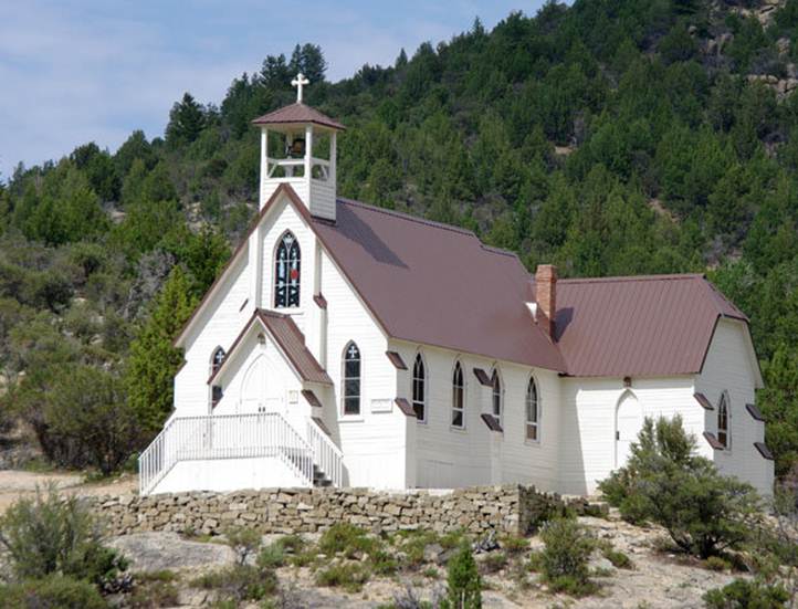 Our Lady of Tears Catholic church, a small white wood-frame chapel still standing in modern Silver City, Idaho
