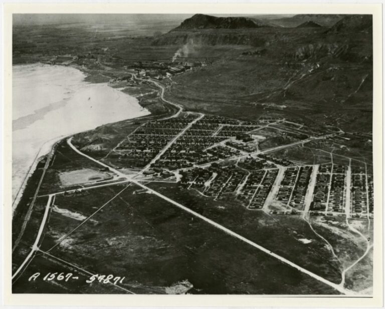 Aerial view of Garfield, Utah, in 1929 showing the company town beside the copper smelter