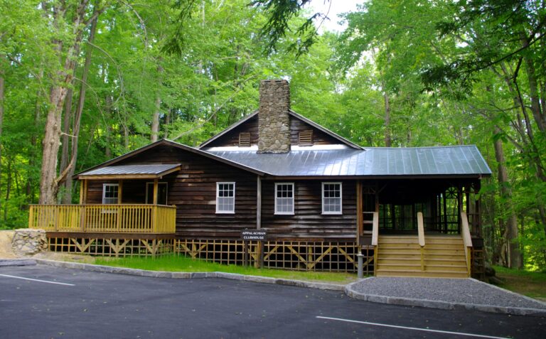 The historic Appalachian Clubhouse at Elkmont, Tennessee, a large rustic clubhouse building set among trees in Great Smoky Mountains National Park