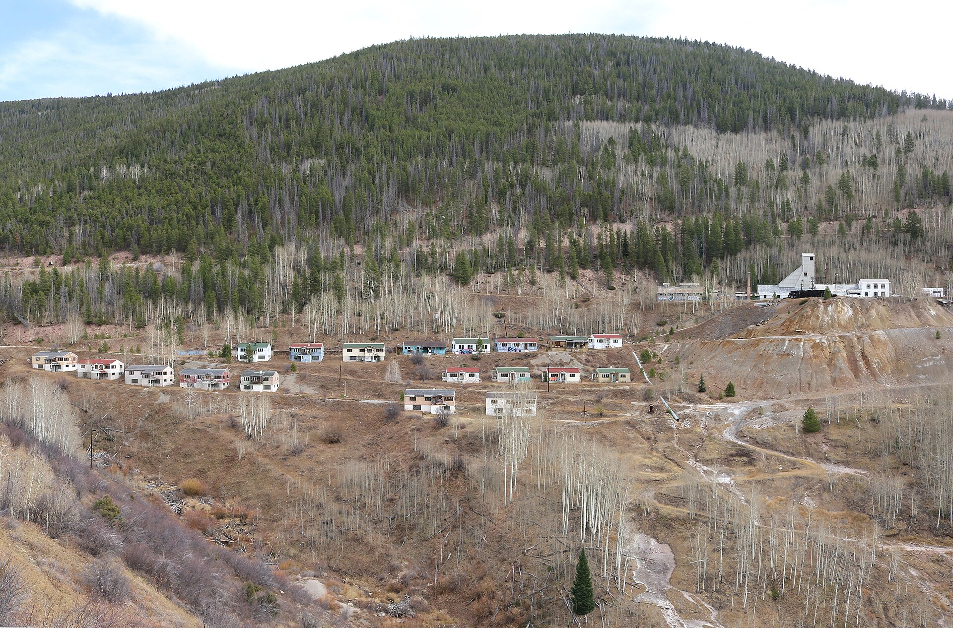 The abandoned town of Gilman clinging to the cliff above the Eagle River canyon.
